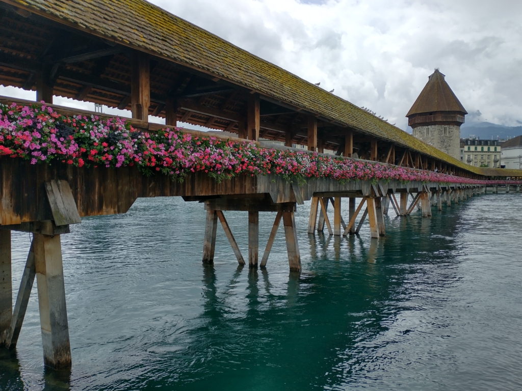 The Chapel Bridge in Lucerne, decorated with many flowers